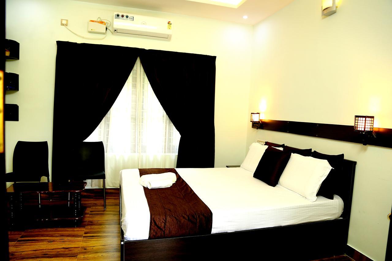 Amritham Holidays Homestay Trivandrum Thiruvananthapuram Bagian luar foto