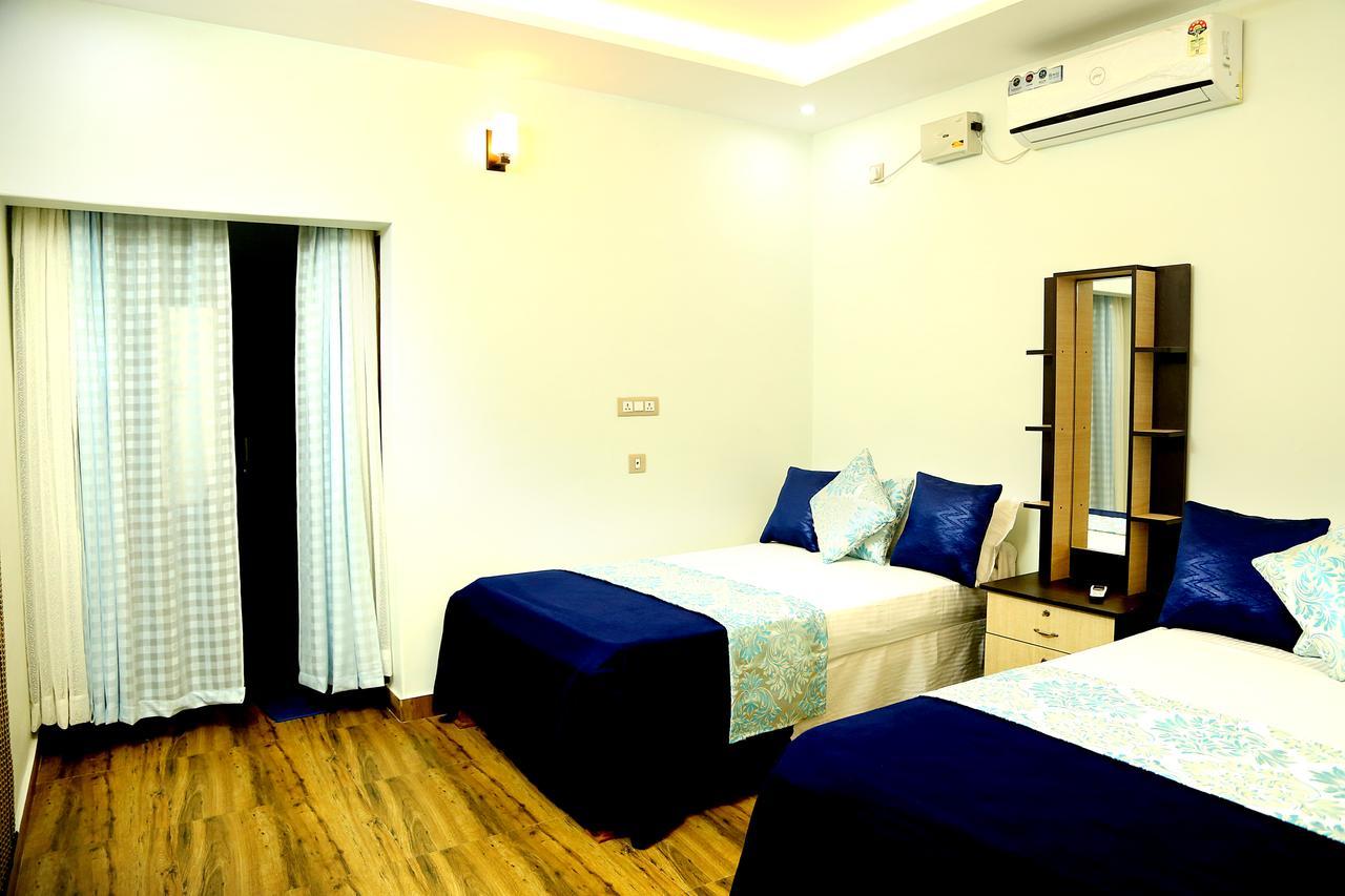 Amritham Holidays Homestay Trivandrum Thiruvananthapuram Bagian luar foto